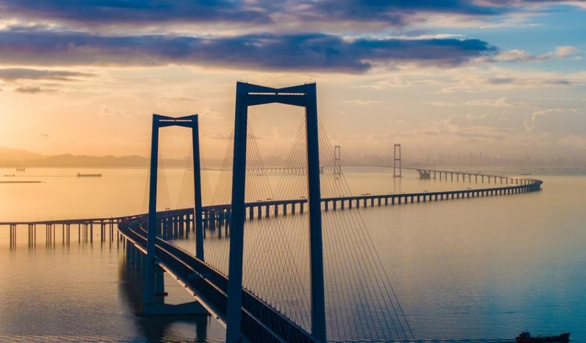 An aerial drone photo of the Shenzhen-Zhongshan Link at sunrise in South China's Guangdong Province. (Photo: Xinhua/Mao Siqian) An aerial drone photo of the Shenzhen-Zhongshan Link at sunrise in South China's Guangdong Province. (Photo: Xinhua/Mao Siqian)
